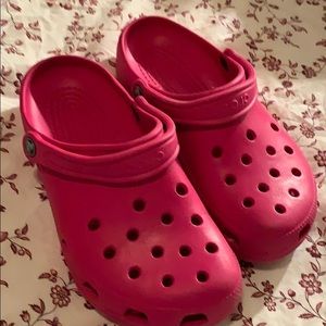 Pink crocs